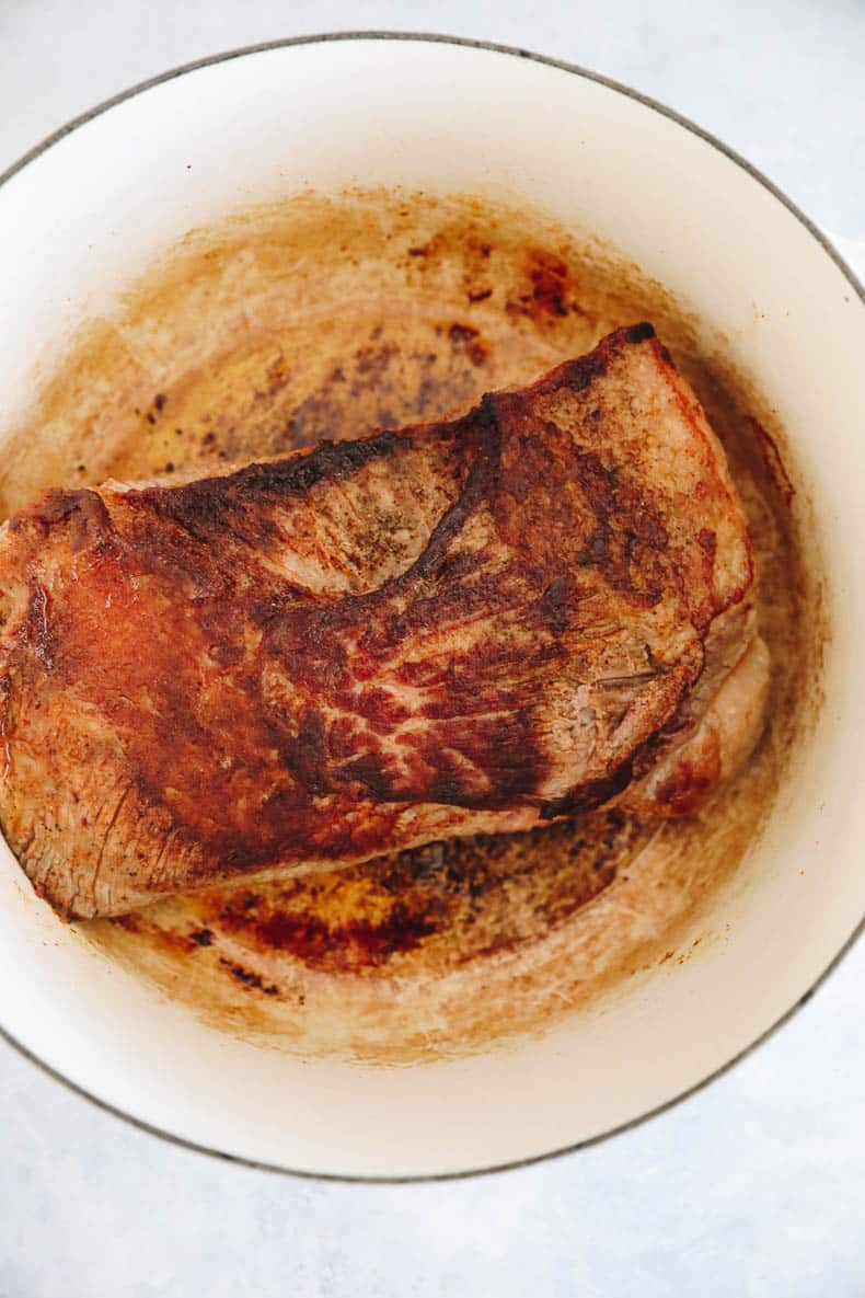 seared brisket in a dutch oven