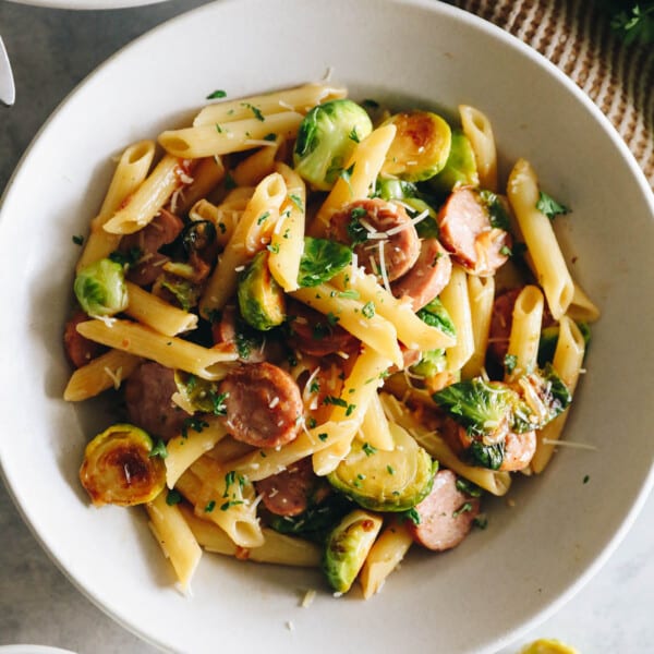 Chicken Sausage Pasta in a white shallow bowl.