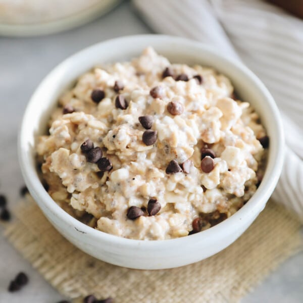 cookie dough overnight oats in a small bowl with chocolate chips